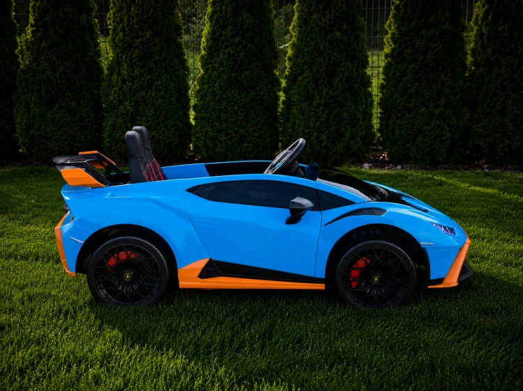 Lamborghini Huracan STO Drift 24V dla Dzieci – 2x775W, Drift 360°, Pilot 2.4G, Bluetooth, Koła EVA, Niebieski