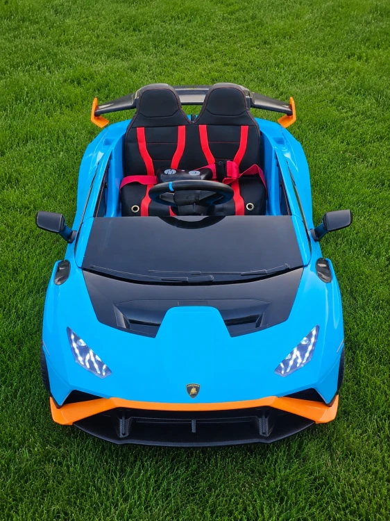 Lamborghini Huracan STO Drift 24V dla Dzieci – 2x775W, Drift 360°, Pilot 2.4G, Bluetooth, Koła EVA, Niebieski
